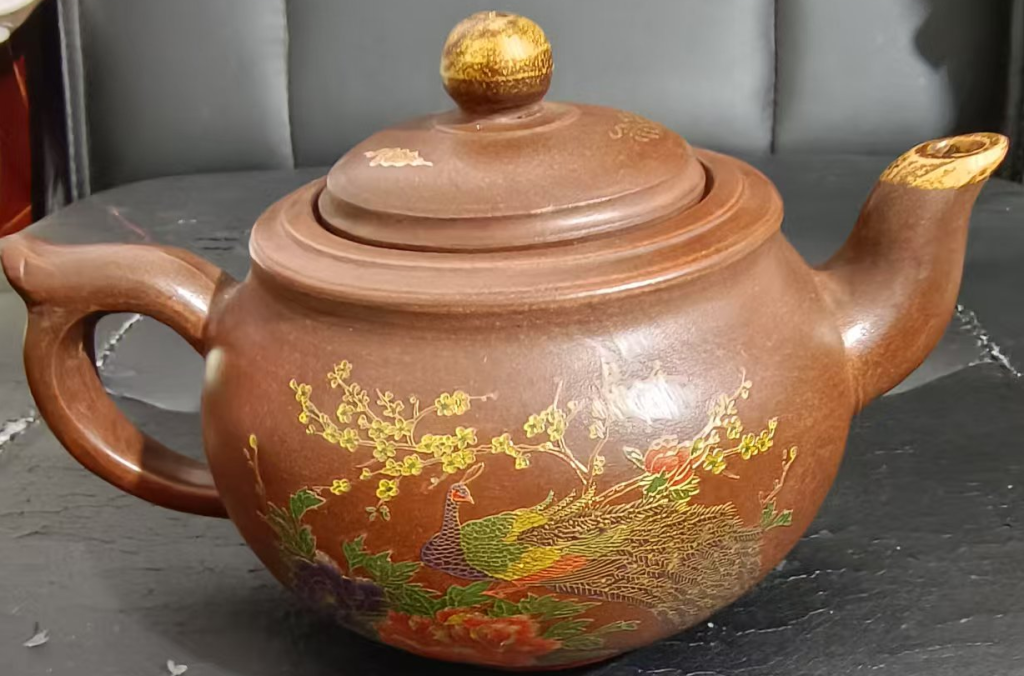 图片[1]-顾景舟《孔雀》紫砂壶-嘉诚艺术