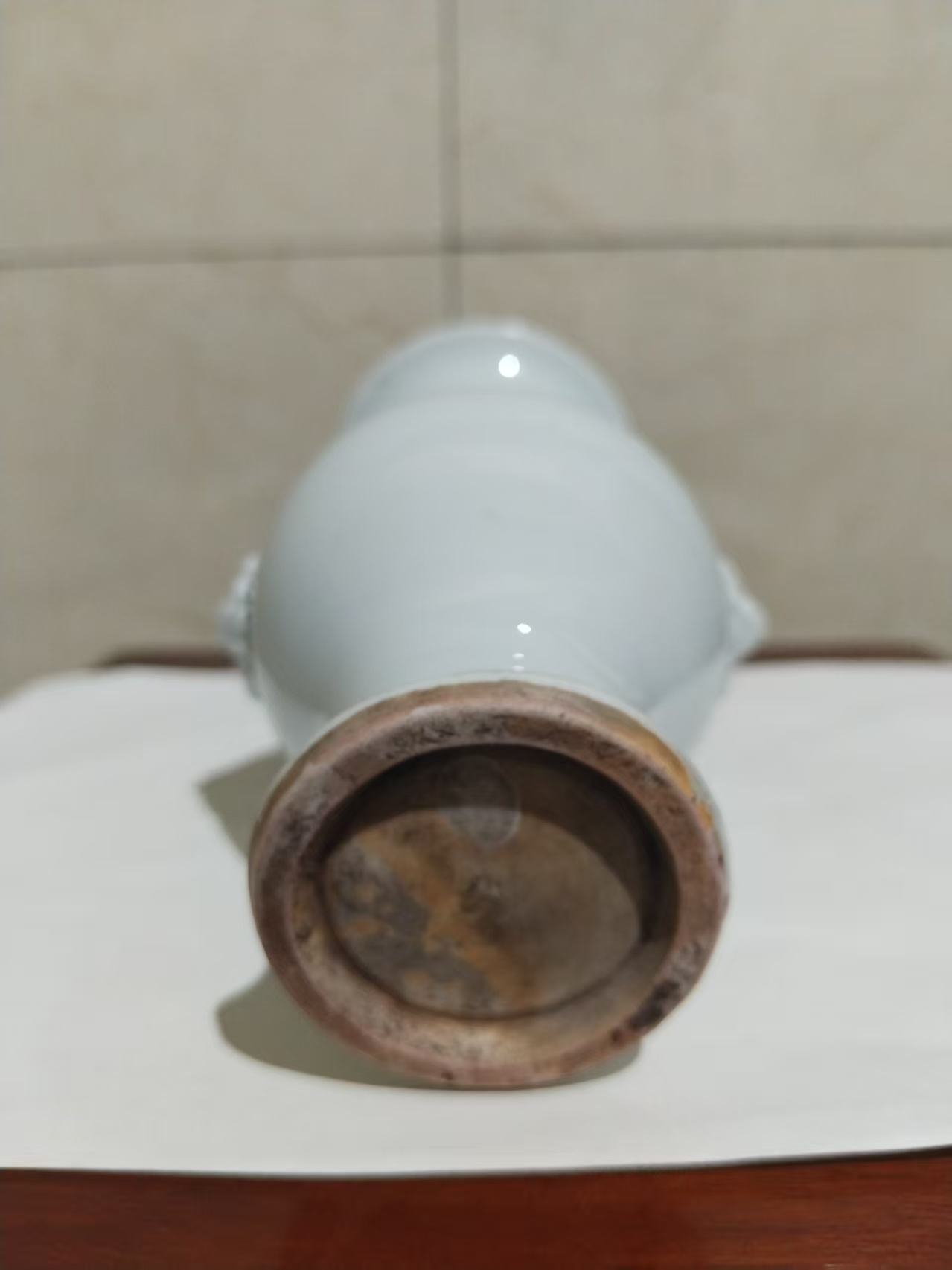 清代《梅子青釉狮首瓶》