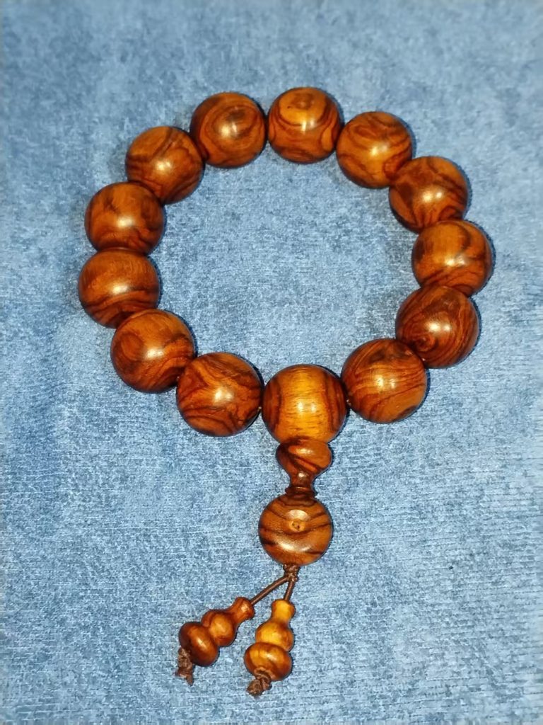 图片[1]-海南黄花梨对眼手串-嘉诚艺术